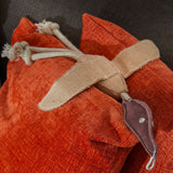 Eco Dog Toy Desmond the Duck placed on cushion