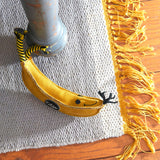 Eco-Toy Barry the Banana on rug 